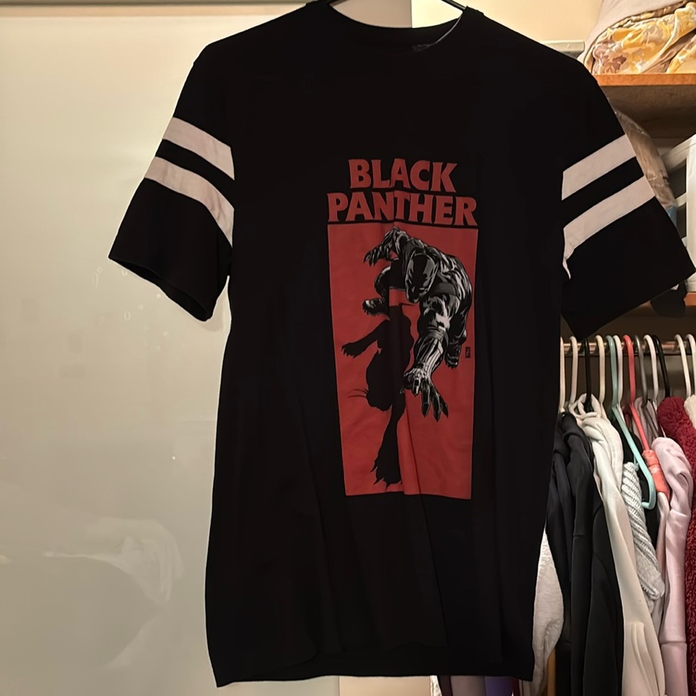 A marvel shirt. No name brand just bought from beals.